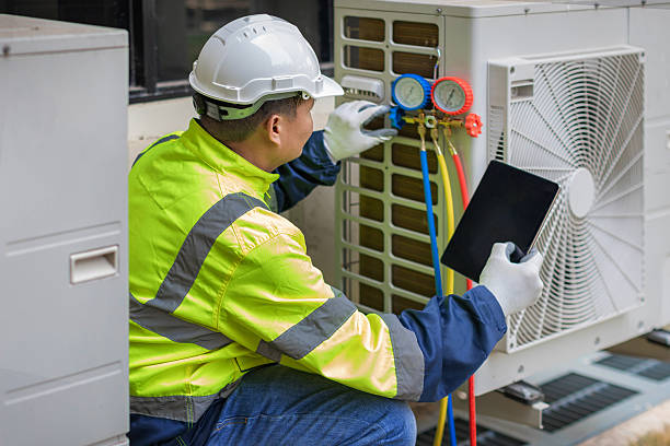 Professional Hvac technician working in Camanche, IA
